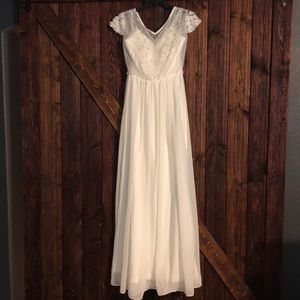 Beautiful hand beaded white formal gown